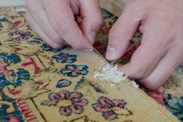 Persian rug during restoration process